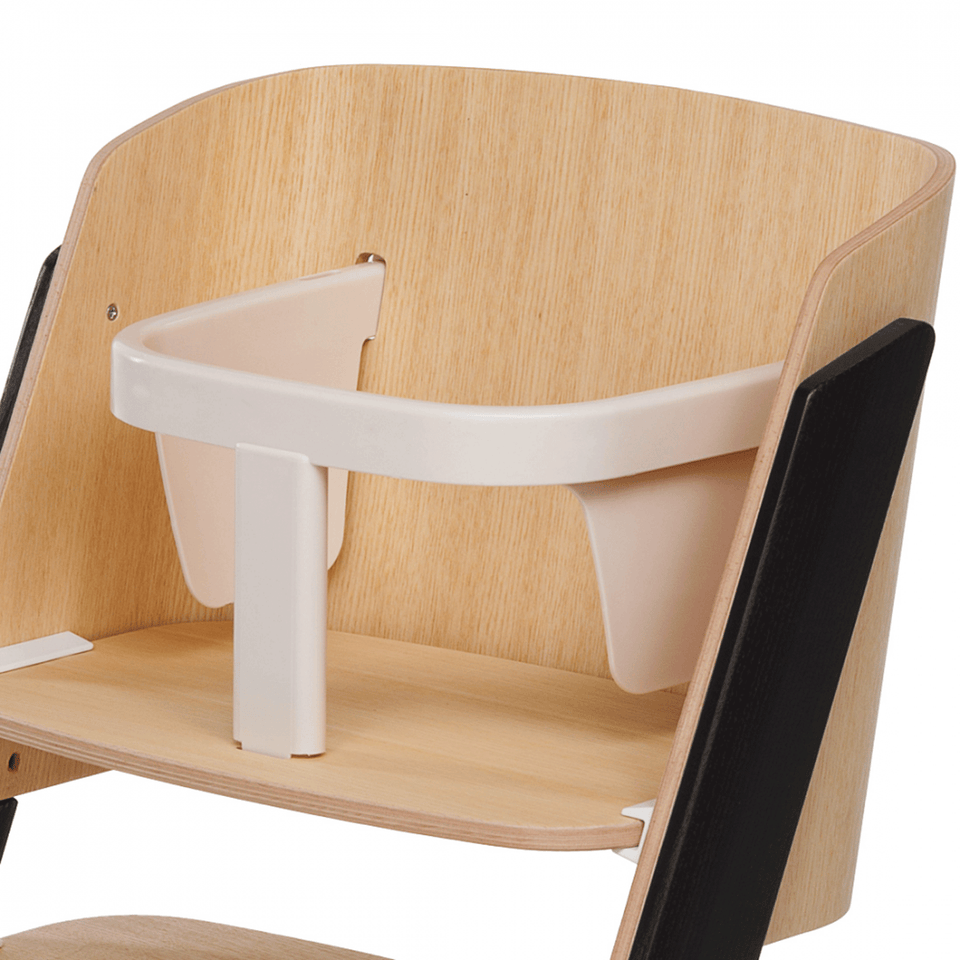 The is a safety barrier ( cream colour ) for the TIRAMISÙ high chair, it perfectly fits for the evolutionary high-chair to ensure your child's safety. Designed and made in Italy.